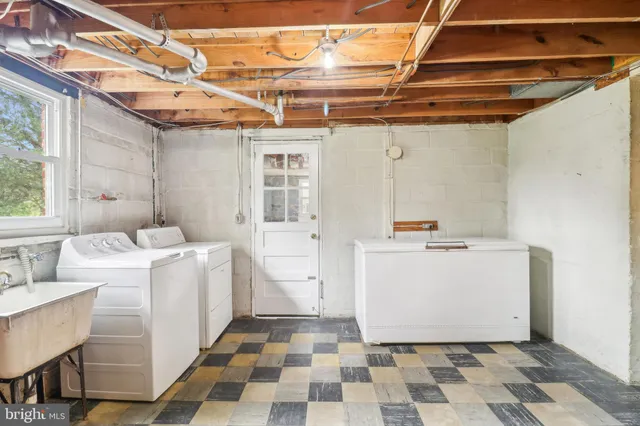 a view of a playground with a house
