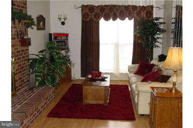 13370 Green Pine Road Waldorf, MD 20601 - Photo 3 of 16 a living room with furniture and a potted plant