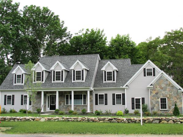 313 South Main Street Andover, MA 01810 - Photo 1 of 26 a front view of a house with garden