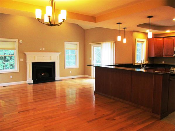 313 South Main Street Andover, MA 01810 - Photo 11 of 26 a kitchen with a sink and a fireplace