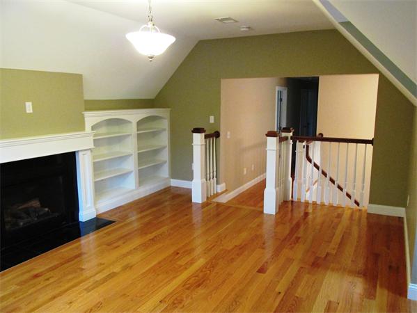 313 South Main Street Andover, MA 01810 - Photo 18 of 26 a view of empty room with wooden floor and fan