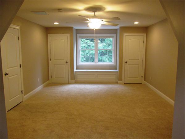 313 South Main Street Andover, MA 01810 - Photo 20 of 26 a view of empty room with a ceiling fan