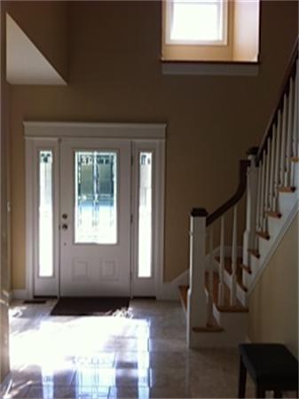 313 South Main Street Andover, MA 01810 - Photo 6 of 26 a view of an entryway with wooden floor and door