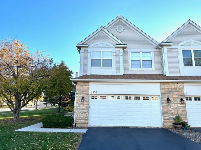 front view of a house with a garden