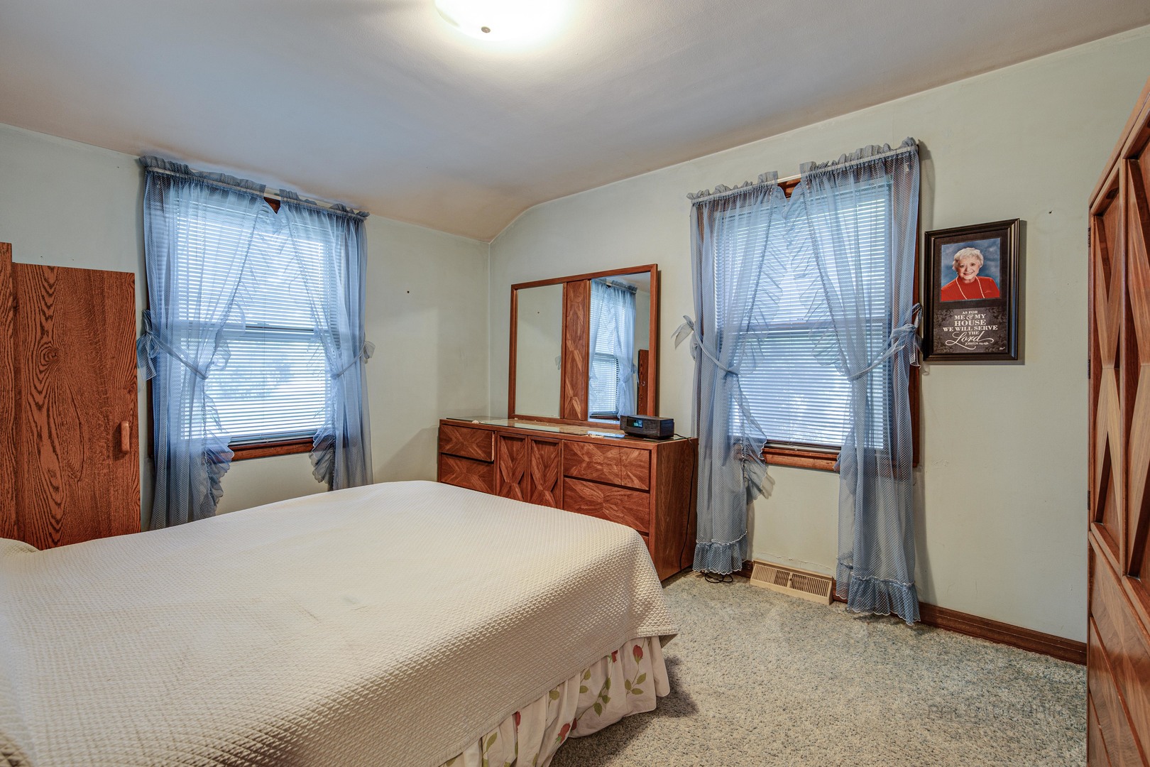54 North Rohlwing Road Palatine, IL 60074 - Photo 15 of 24 a bedroom with a bed and a refrigerator