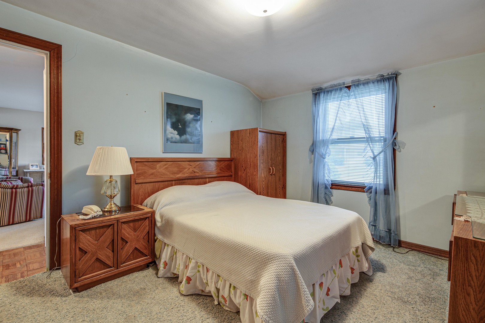 54 North Rohlwing Road Palatine, IL 60074 - Photo 16 of 24 a bedroom with a bed and wooden floor