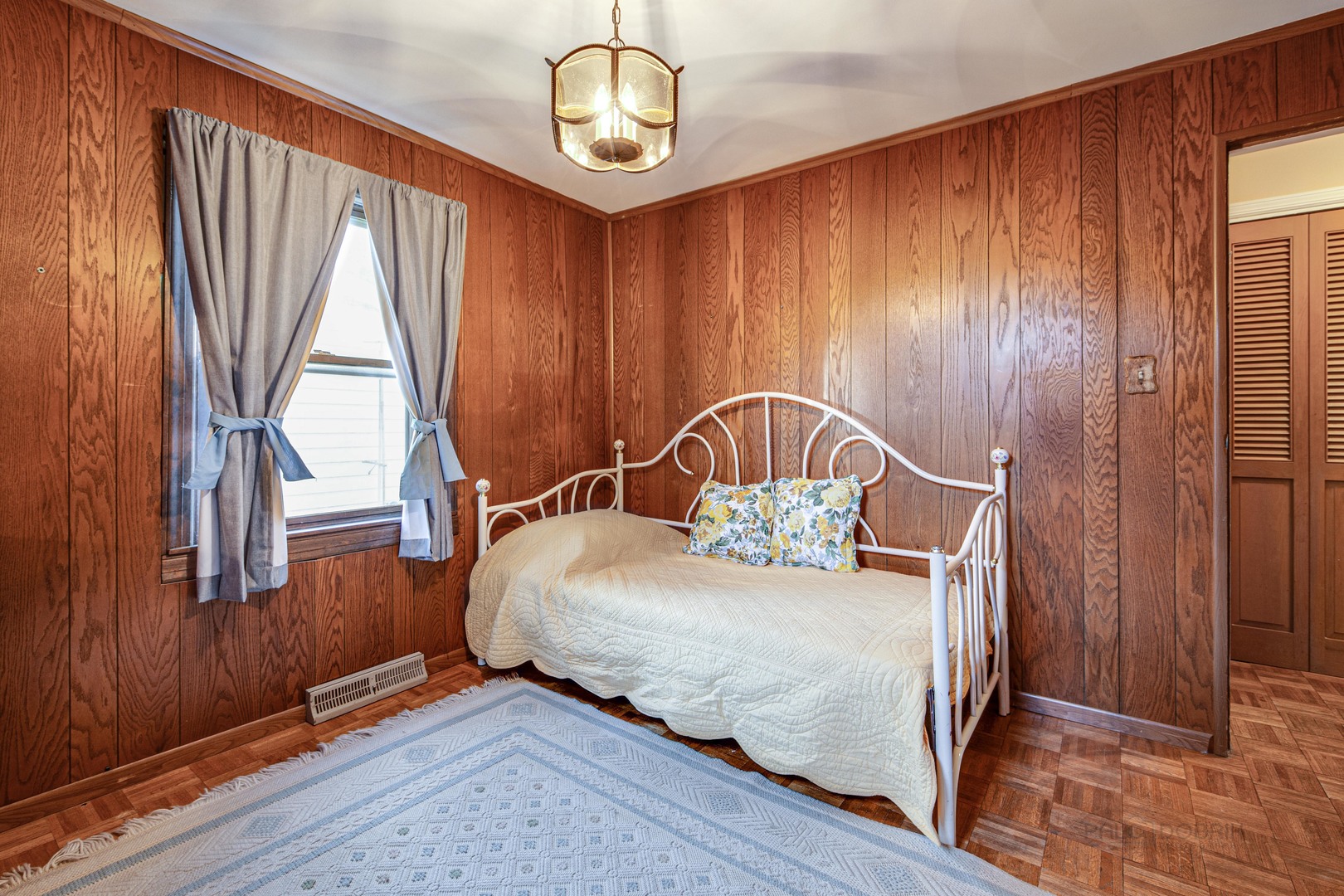 54 North Rohlwing Road Palatine, IL 60074 - Photo 19 of 24 a bedroom with a bed window and a wooden floor