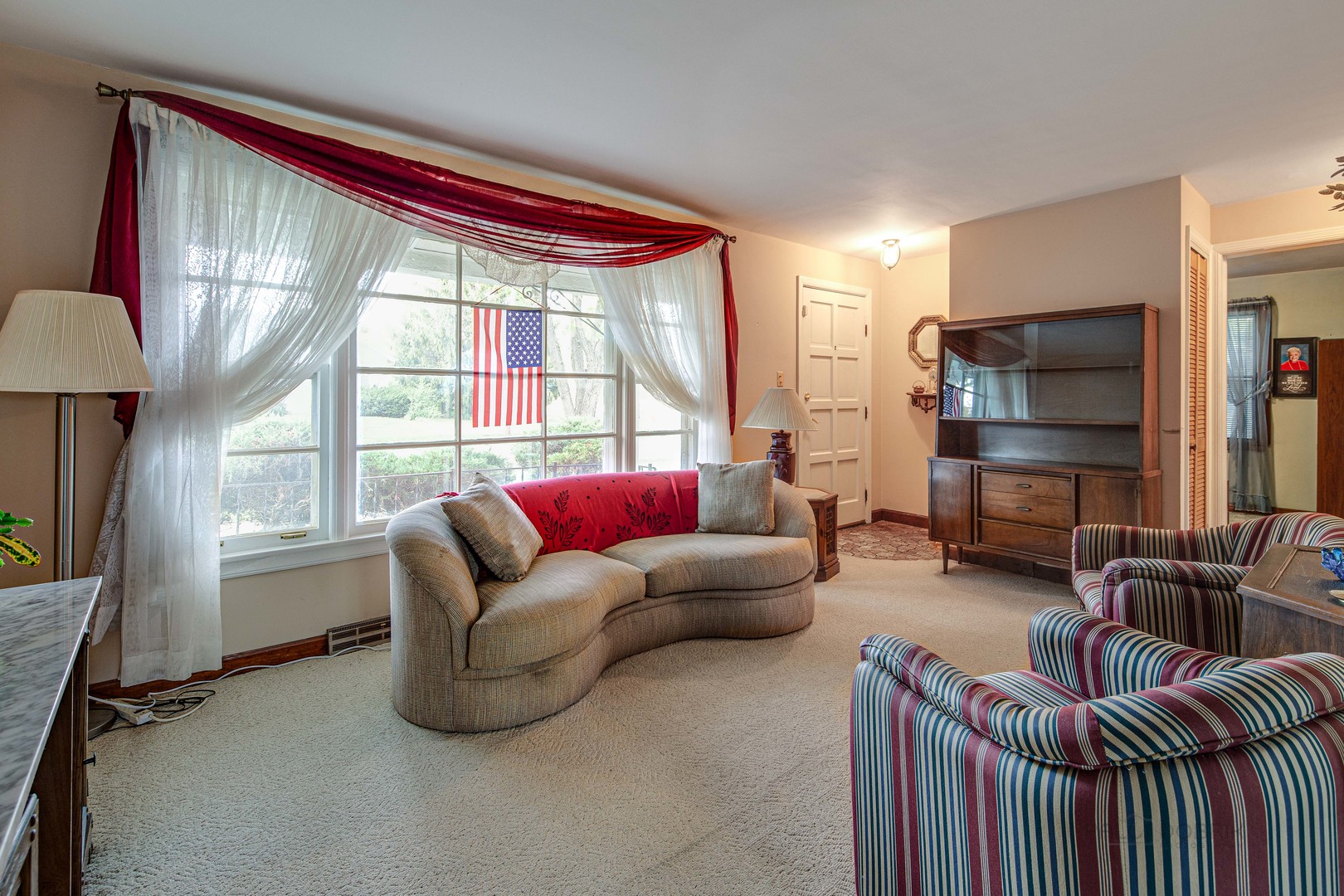 54 North Rohlwing Road Palatine, IL 60074 - Photo 3 of 24 a living room with furniture and a window