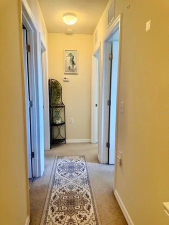 a view of hallway with walk in closet