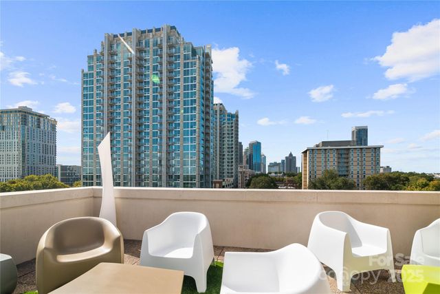 a view of balcony with outdoor seating