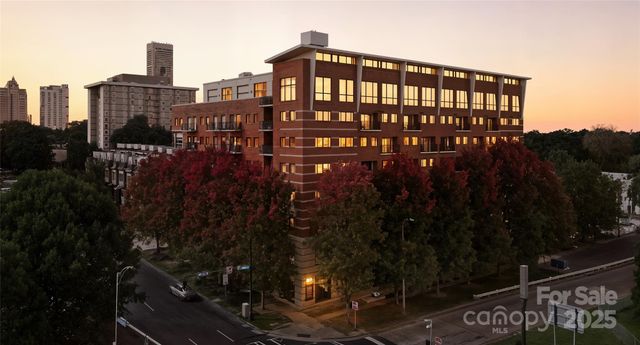 a view of a city with tall buildings