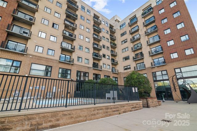 a view of a building with a street