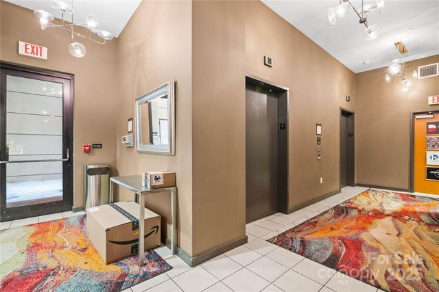 a bedroom with a bed and furniture