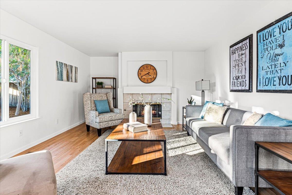 9395 Durango Lane Gilroy, CA 95020 - Photo 16 of 30 a living room with furniture and a fireplace