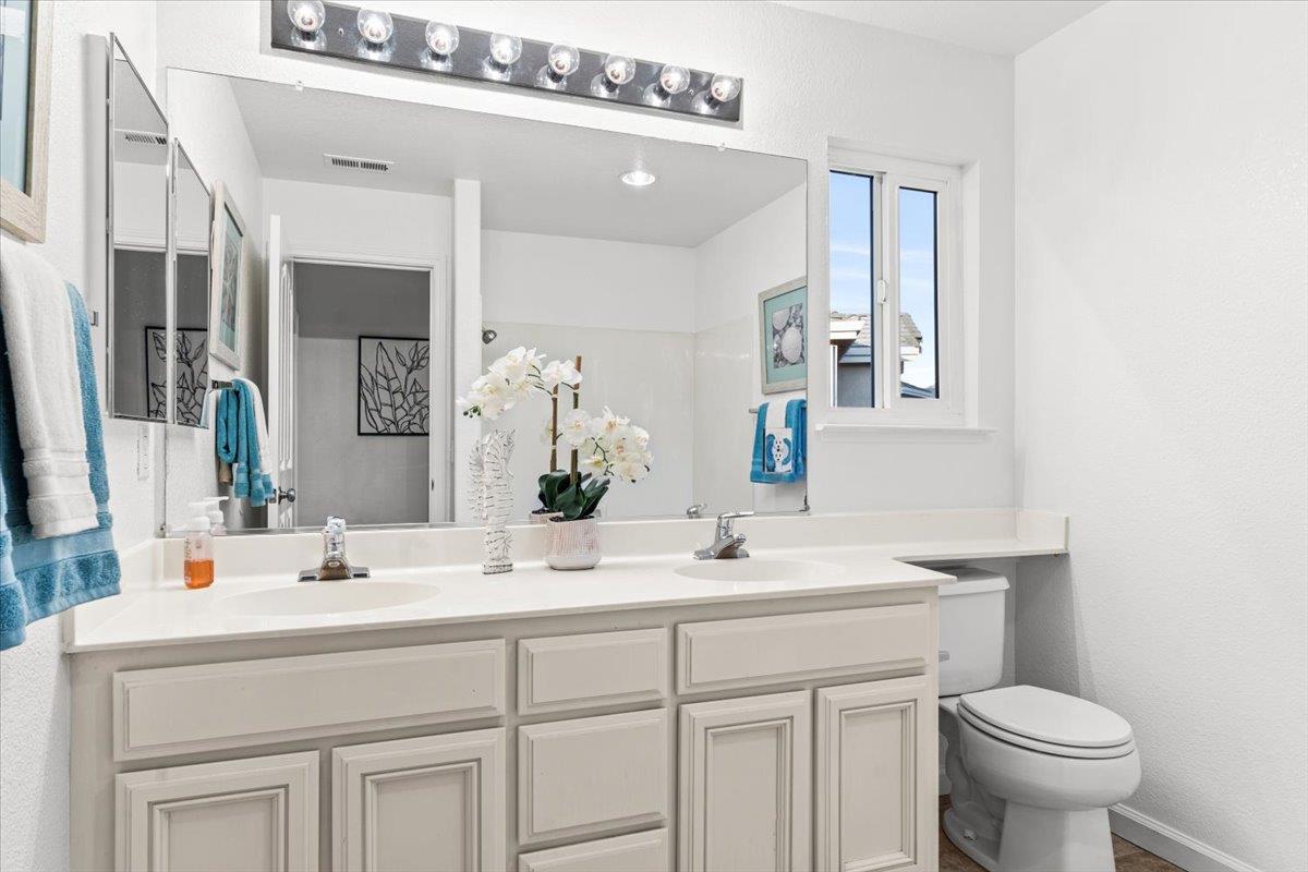 9395 Durango Lane Gilroy, CA 95020 - Photo 20 of 30 a bathroom with a sink and a toilet