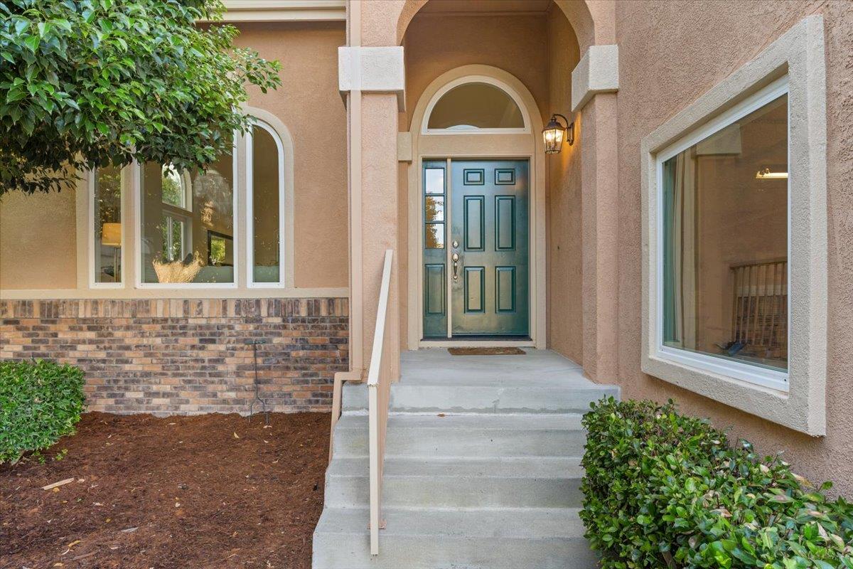 9395 Durango Lane Gilroy, CA 95020 - Photo 2 of 30 a front view of a house with a yard