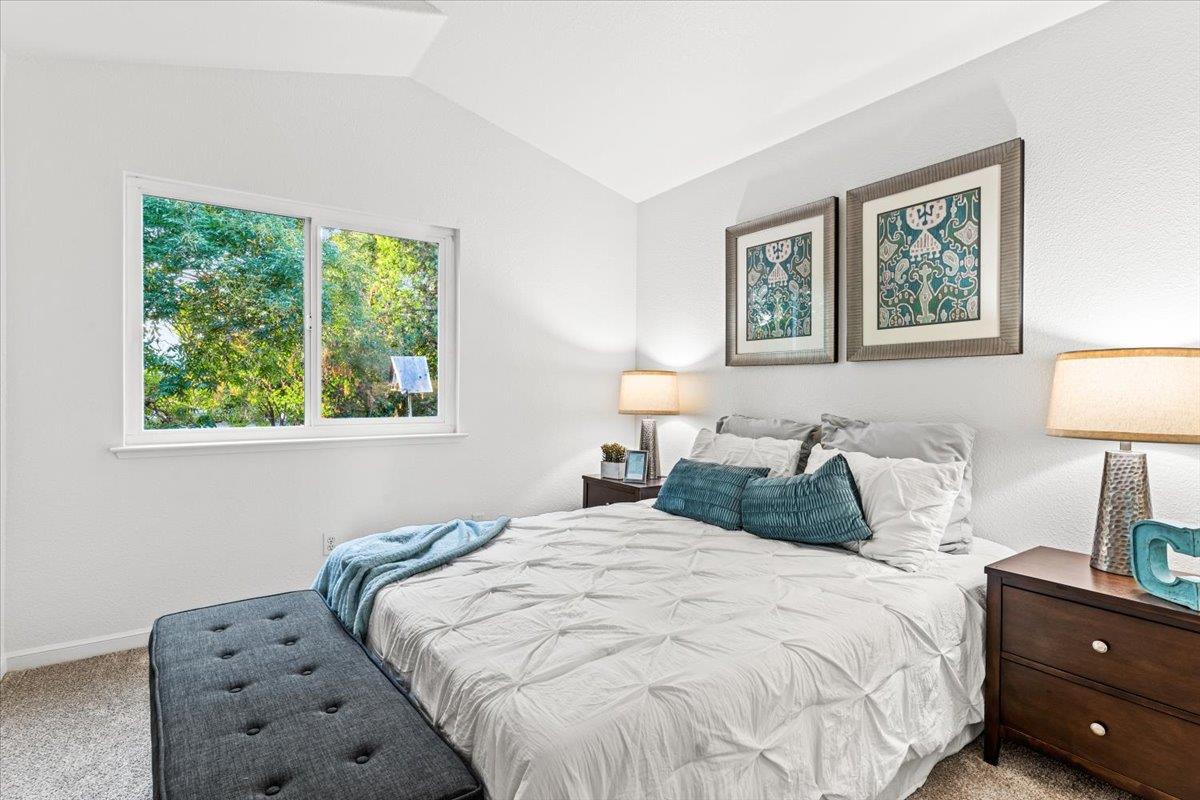 9395 Durango Lane Gilroy, CA 95020 - Photo 21 of 30 a bedroom with a bed and a lamp on dresser