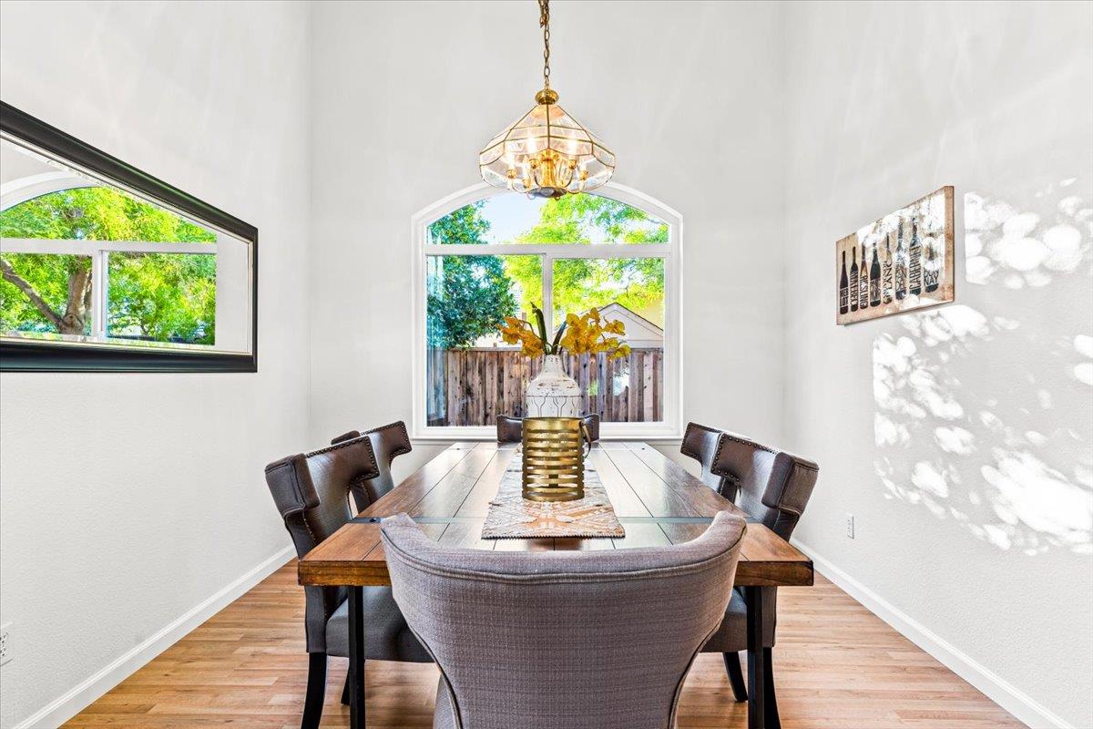9395 Durango Lane Gilroy, CA 95020 - Photo 7 of 30 a view of a dining room with furniture window and wooden floor
