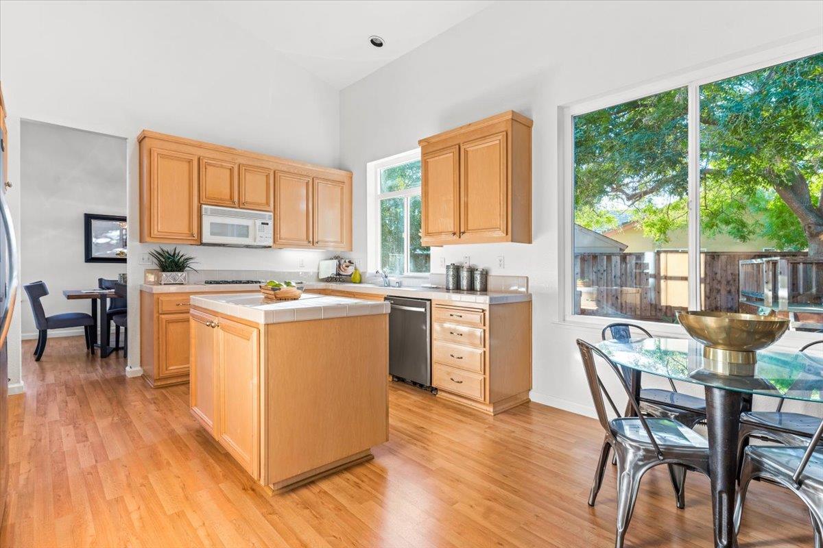 9395 Durango Lane Gilroy, CA 95020 - Photo 10 of 30 a kitchen with a stove a sink a counter top space and appliances