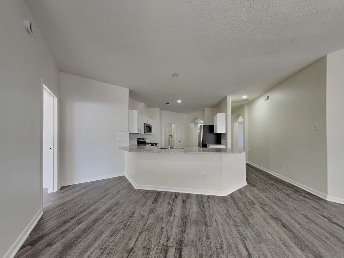 15407 Riford Drive Cypress, TX 77429 - Photo 4 of 13 a view of open kitchen with wooden floor and a sink
