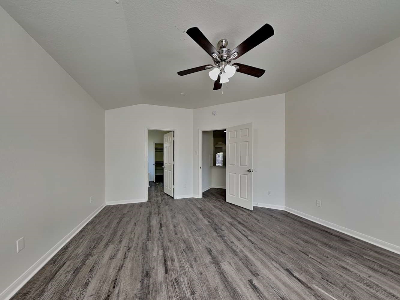 15407 Riford Drive Cypress, TX 77429 - Photo 7 of 13 a view of empty room with wooden floor and window
