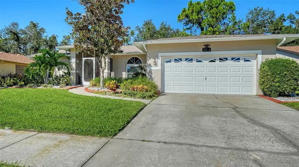 front view of a house with a yard