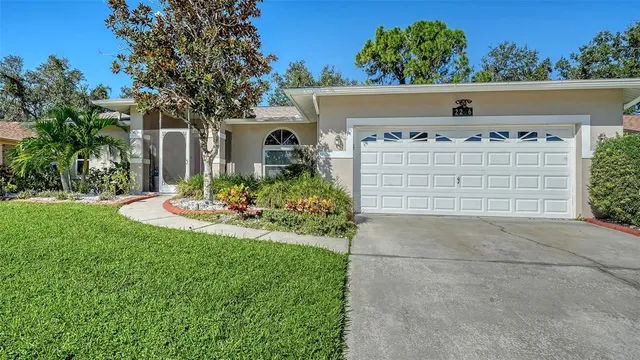 front view of a house with a big yard