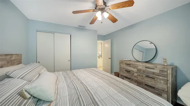 a view of a patio with a chairs and table in a patio