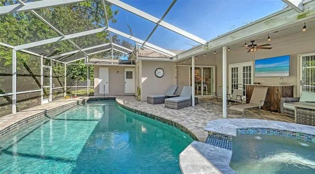 a view of a park with swings and slides