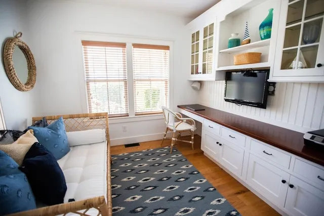 a kitchen with stainless steel appliances a stove a sink and a microwave