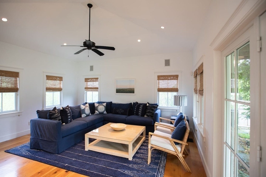 43 Vestal Street Nantucket, MA 02554 - Photo 12 of 19 a living room with furniture a ceiling fan and a window