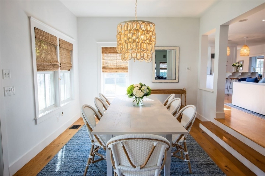 43 Vestal Street Nantucket, MA 02554 - Photo 7 of 19 a view of a dining room with furniture window and wooden floor