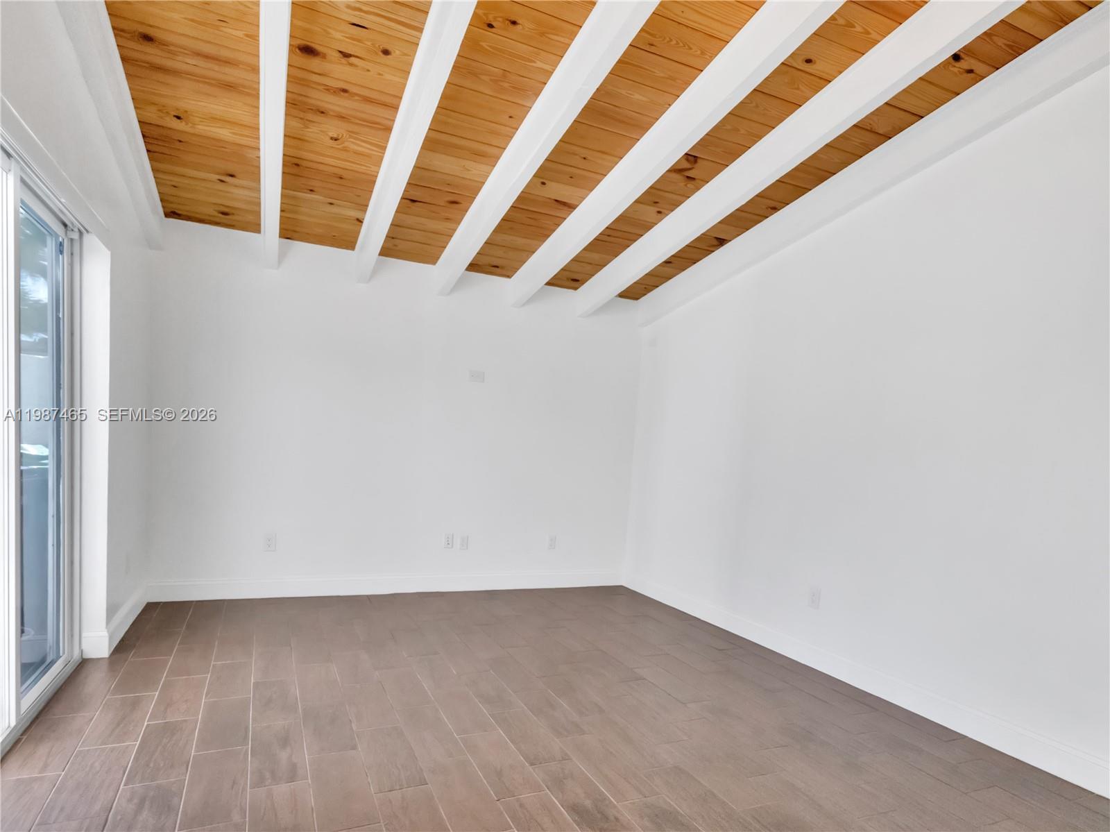 6505 Southwest 113th Place Miami, FL 33173 - Photo 8 of 25 a view of an empty room