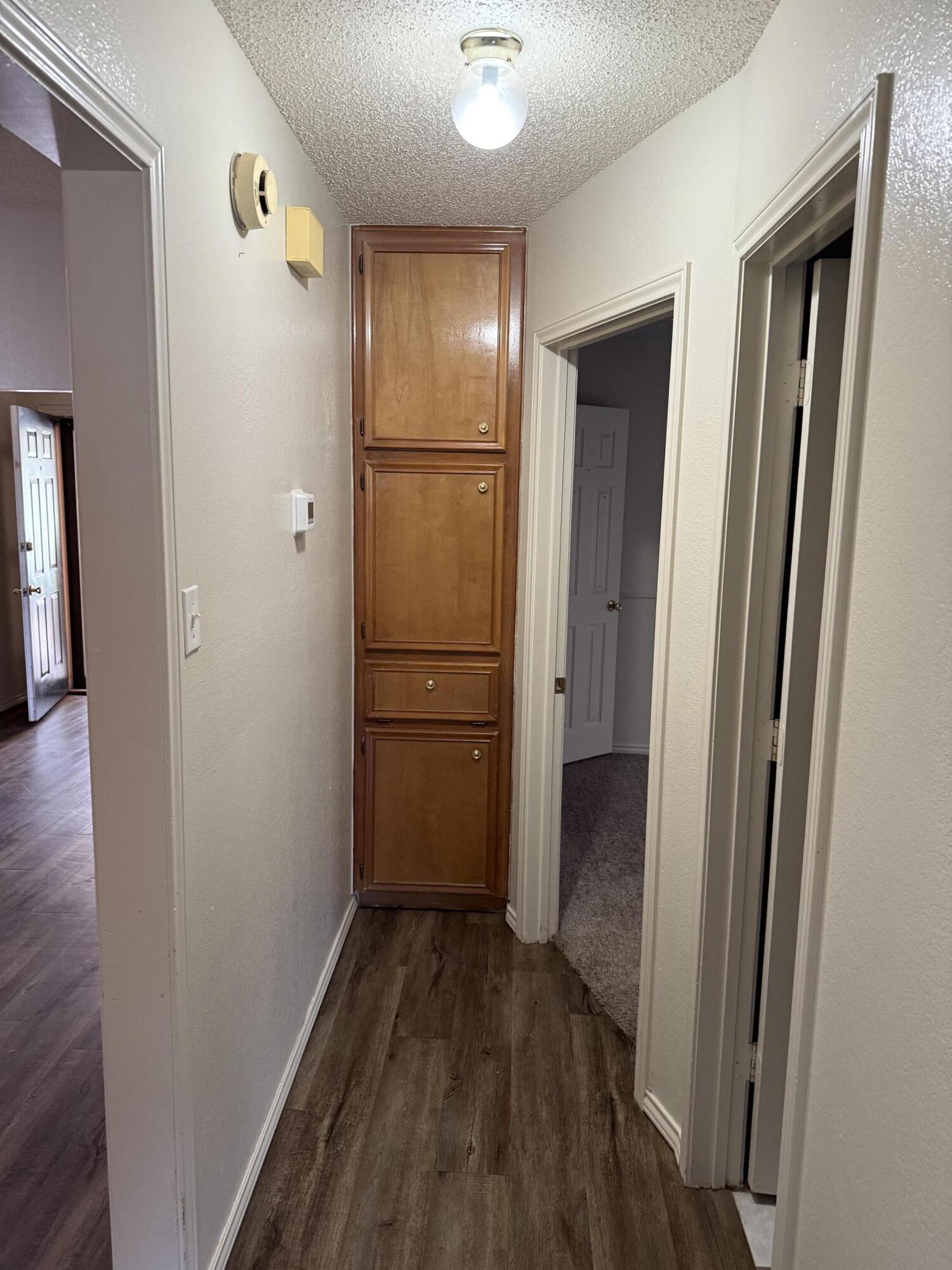 6004 68th Street Lubbock, TX 79424 - Photo 14 of 17 a view of a hallway