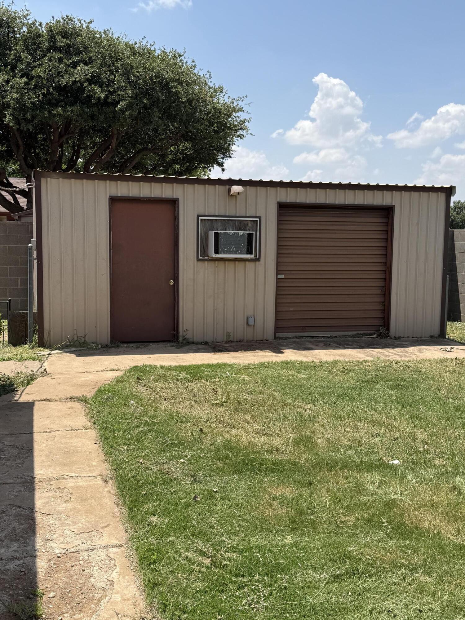 6004 68th Street Lubbock, TX 79424 - Photo 16 of 17 a front view of a house
