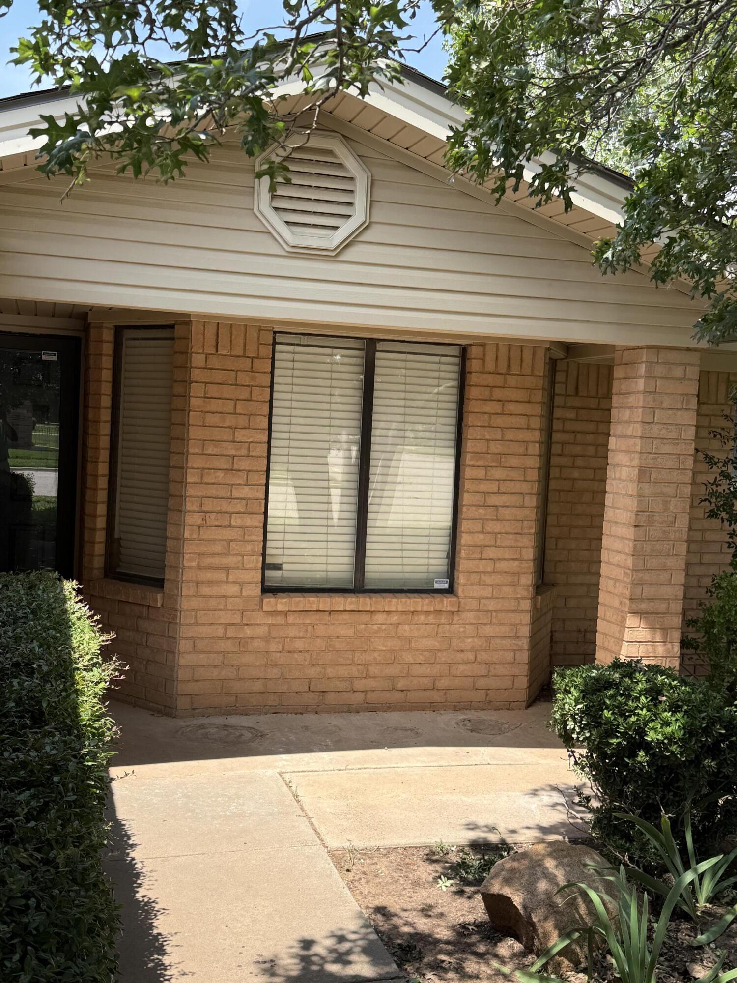 6004 68th Street Lubbock, TX 79424 - Photo 2 of 17 a front view of a house
