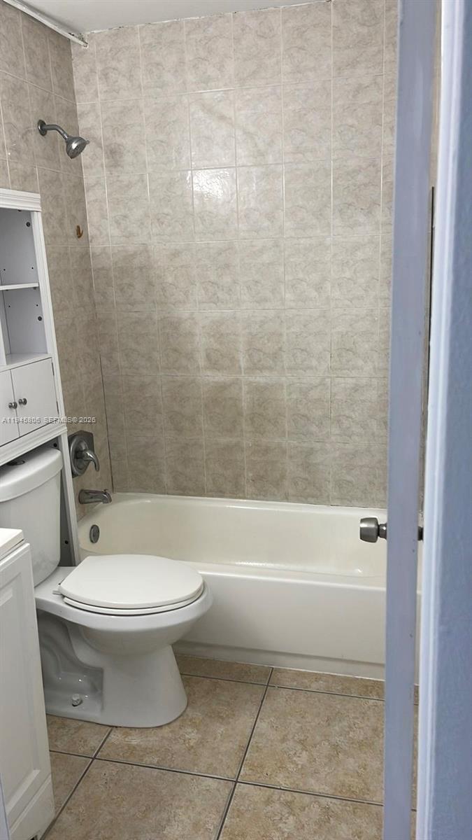 59 West 26th Street, Unit 7 Hialeah, FL 33010 - Photo 3 of 4 a bathroom with a toilet and a shower