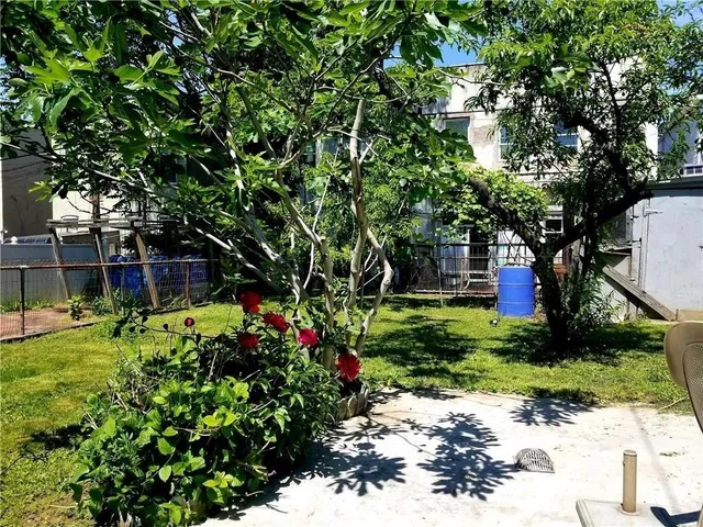 a garden view with a seating space