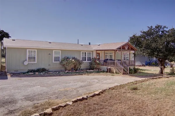 a view of a house with a patio