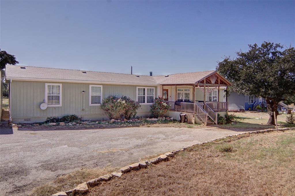 166 Quiten Lane Graham, TX 76450 - Photo 15 of 40 a view of a house with a patio