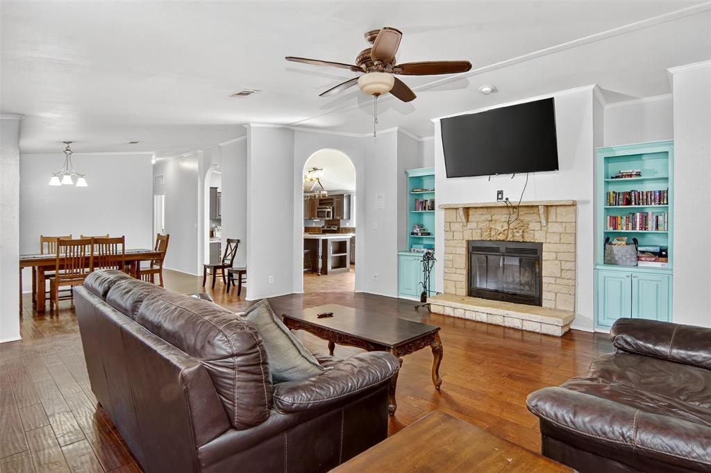 166 Quiten Lane Graham, TX 76450 - Photo 26 of 40 a living room with furniture fireplace and flat screen tv