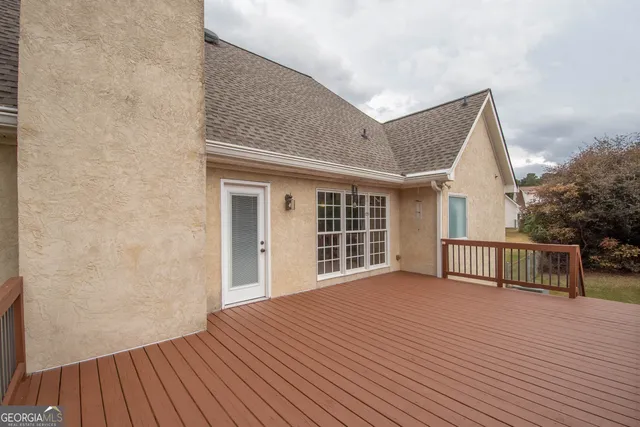 a house with trees in front of it