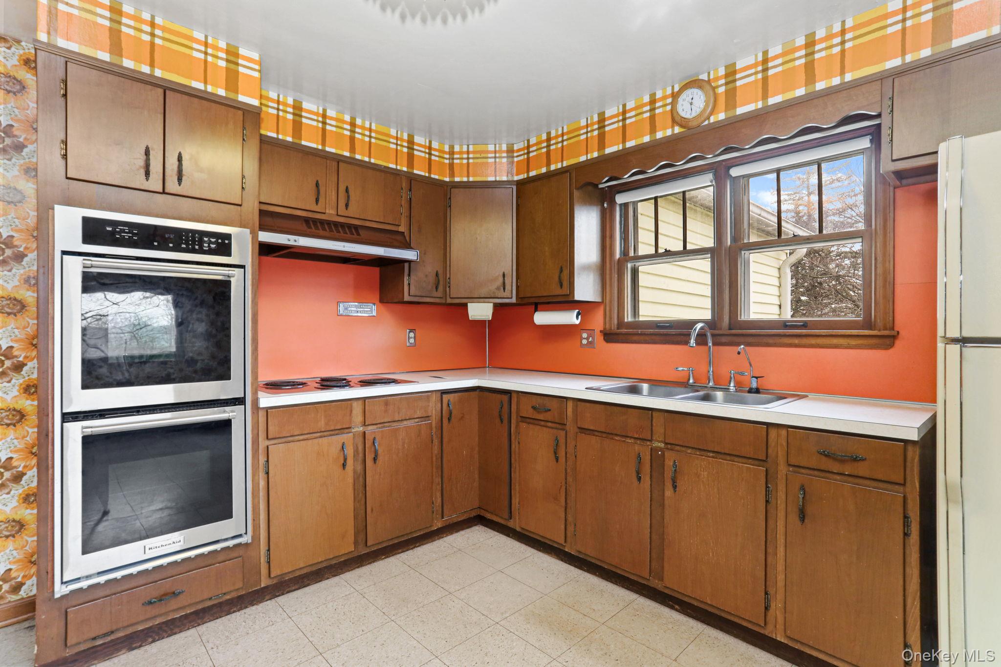 770 Gahbauer Road Hudson, NY 12534 - Photo 7 of 39 a kitchen with stainless steel appliances granite countertop a sink and cabinets