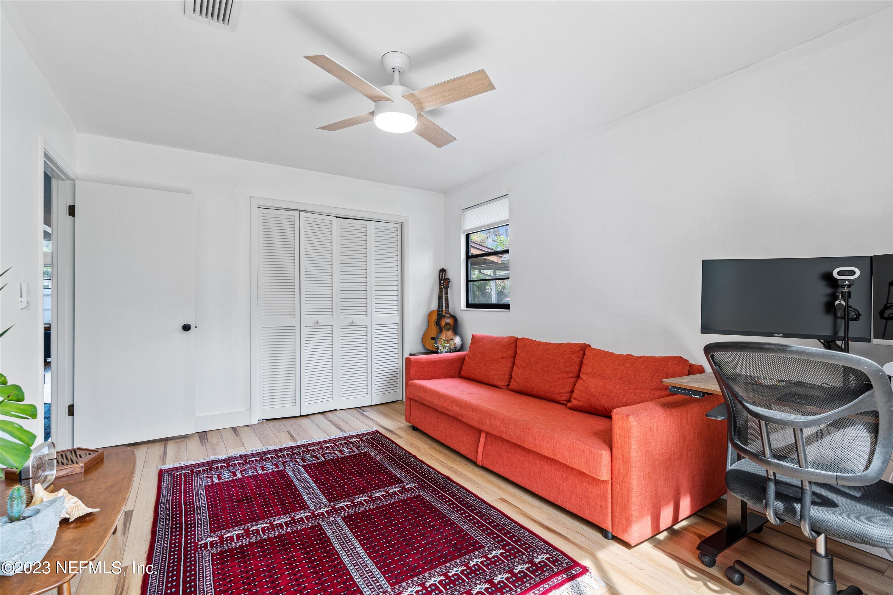 376 9th Street Atlantic Beach, FL 32233 - Photo 16 of 27 a living room with furniture and a rug