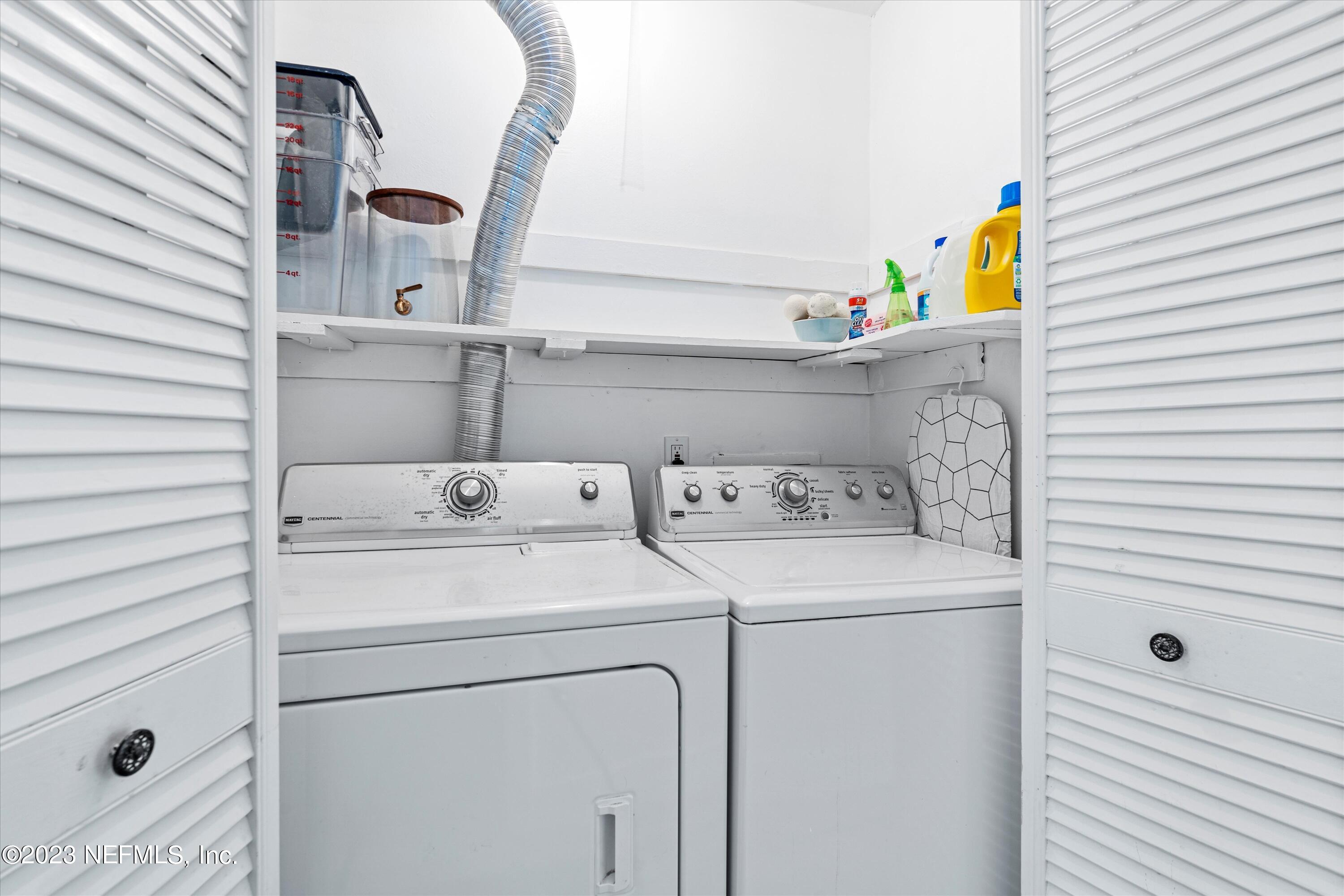 376 9th Street Atlantic Beach, FL 32233 - Photo 21 of 27 a utility room with dryer and washer