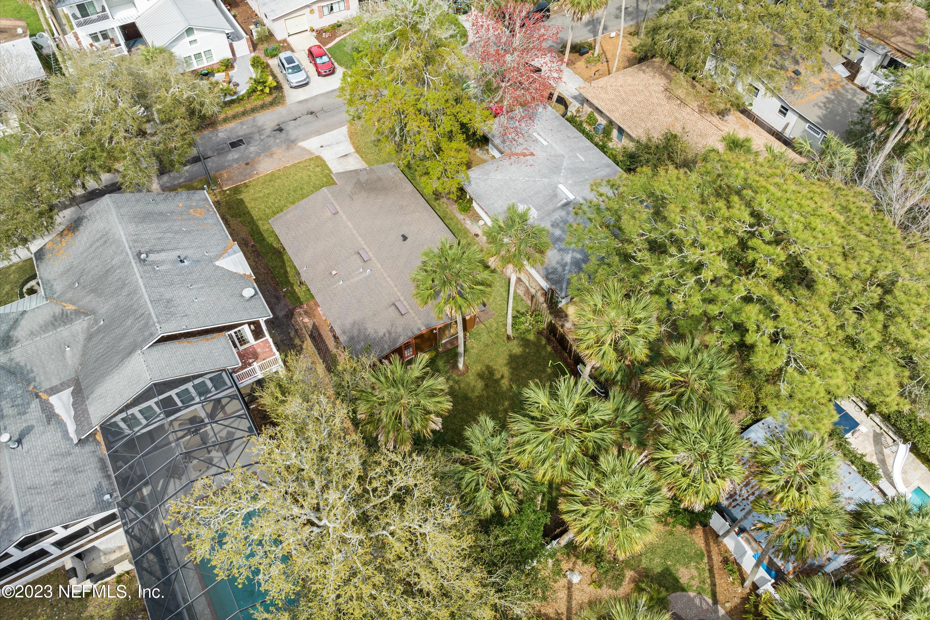 376 9th Street Atlantic Beach, FL 32233 - Photo 24 of 27 an aerial view of a house with a yard and swimming pool