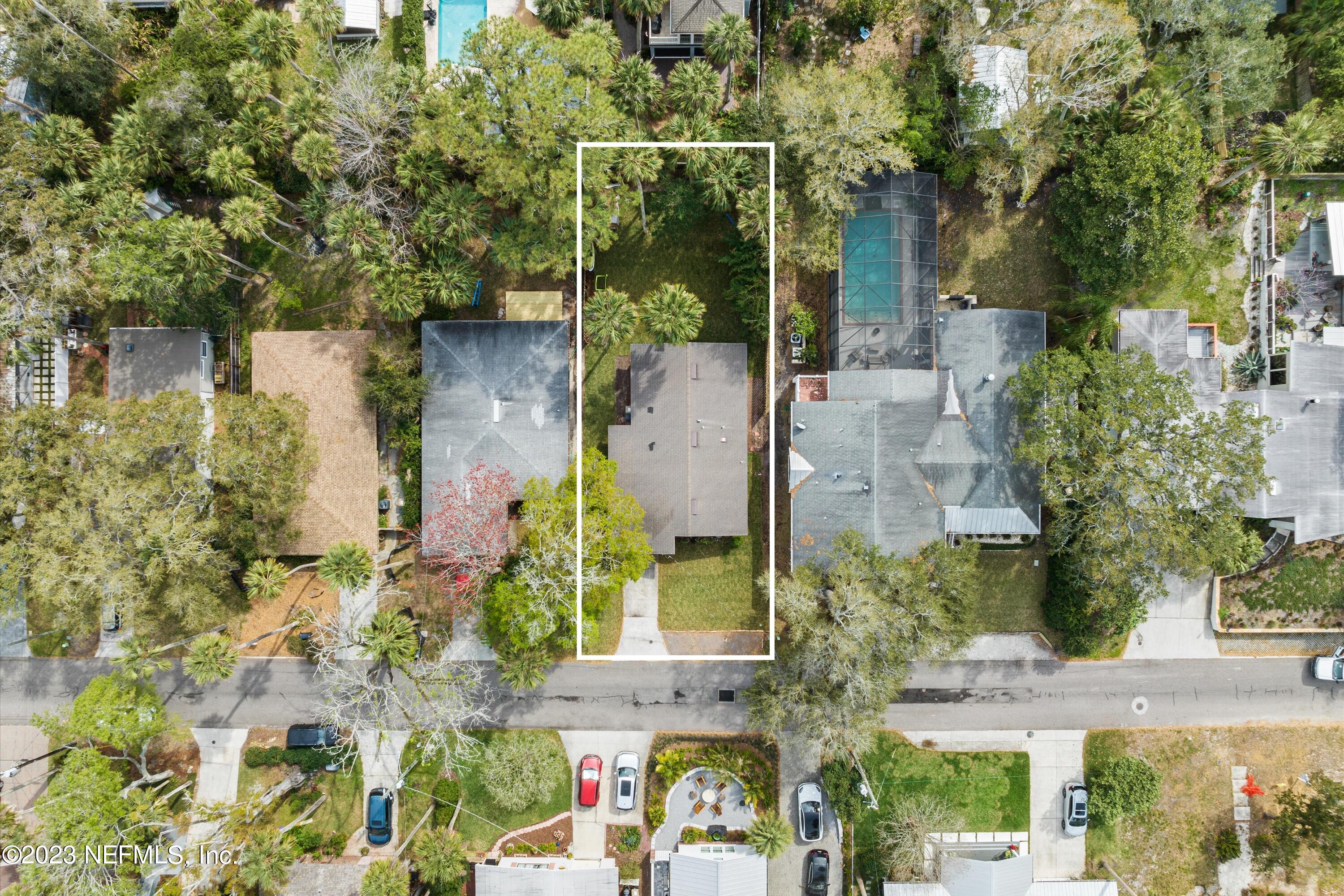 376 9th Street Atlantic Beach, FL 32233 - Photo 25 of 27 front view of a house with a tree