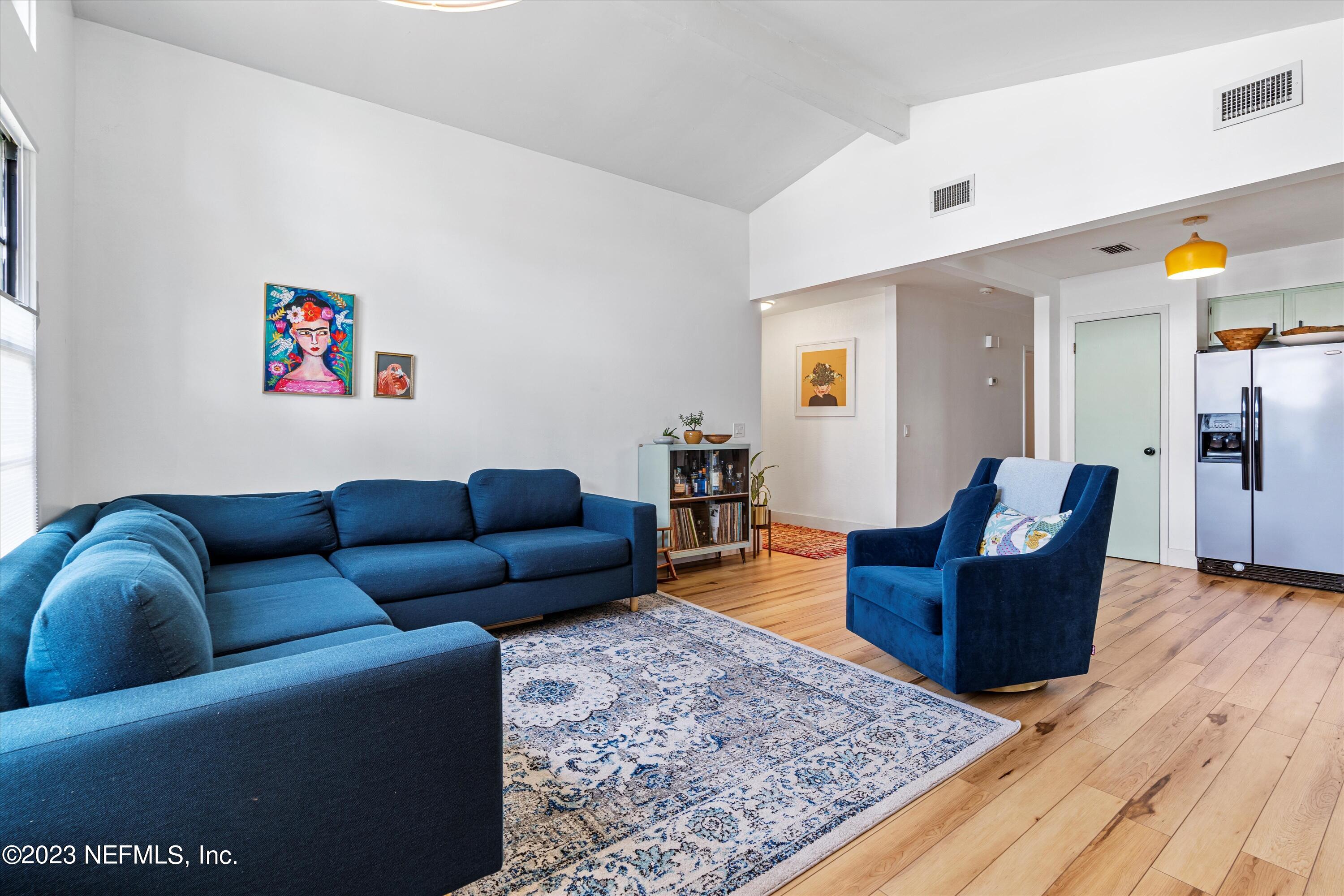376 9th Street Atlantic Beach, FL 32233 - Photo 6 of 27 a living room with furniture and a wooden floor