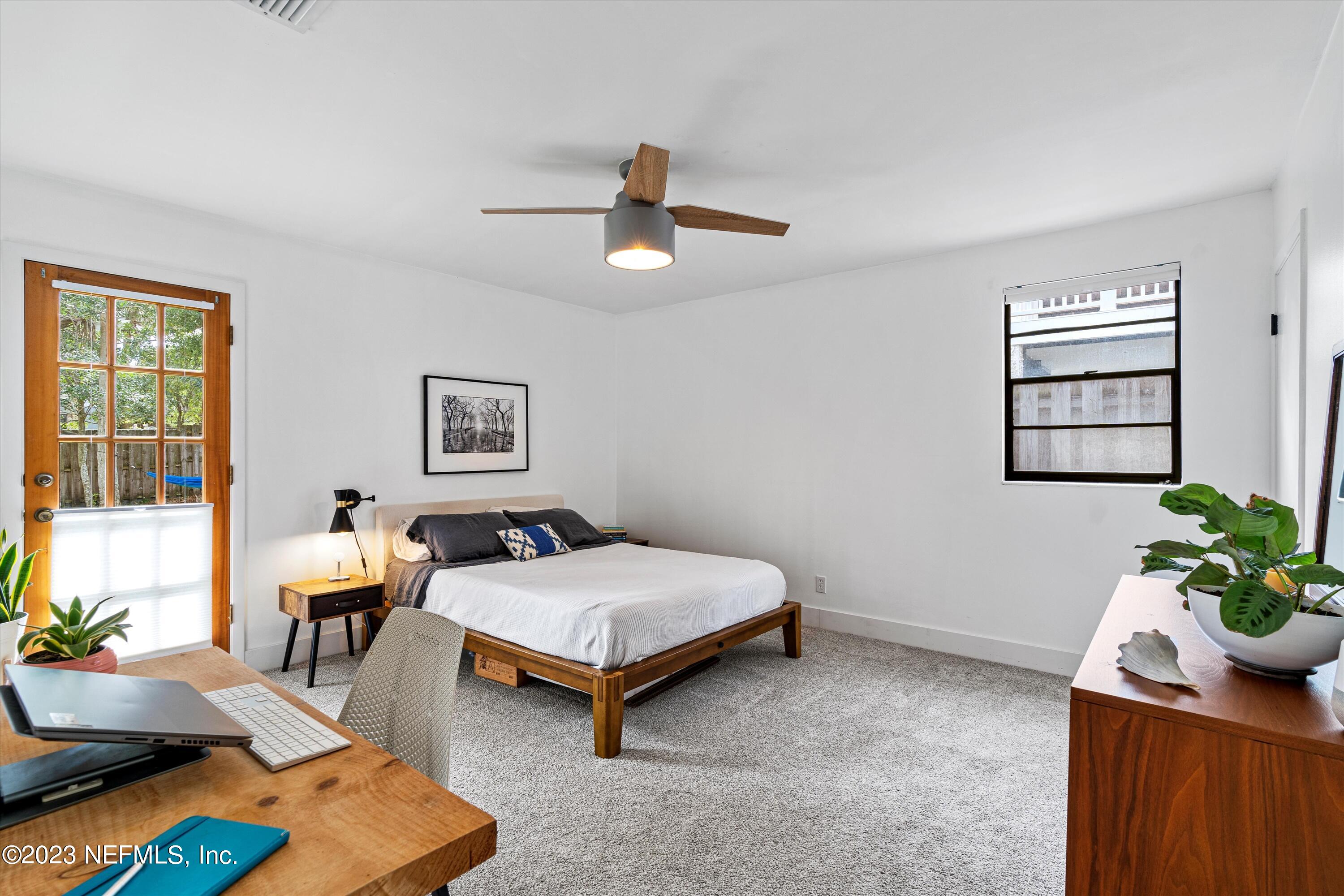 376 9th Street Atlantic Beach, FL 32233 - Photo 10 of 27 a bedroom with furniture and a window