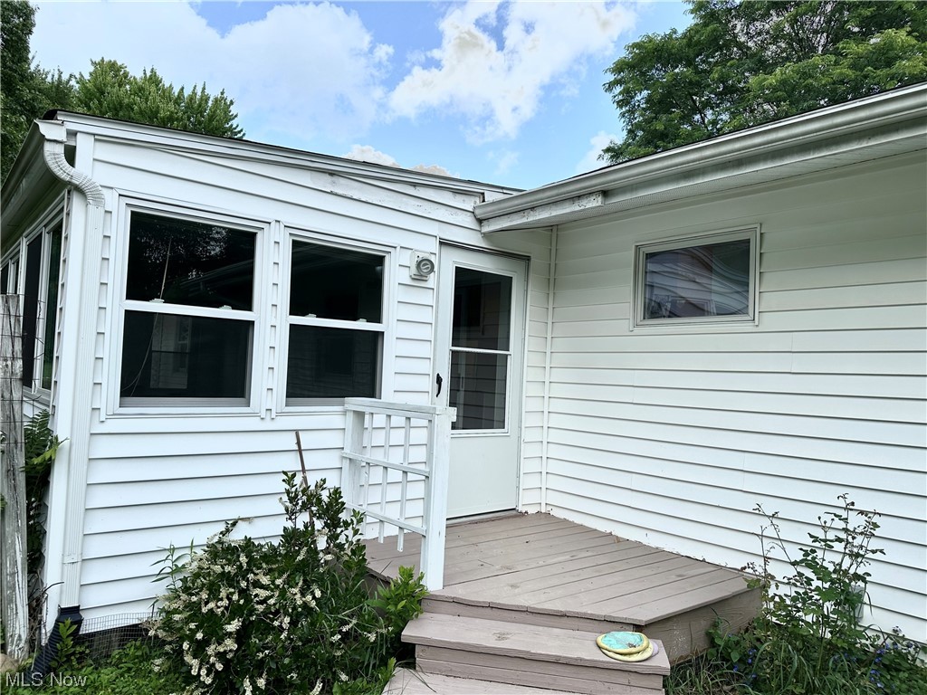 1009 Sandy Lake Road Kent, OH 44240 - Photo 33 of 35 Exterior deck from enclosed porch